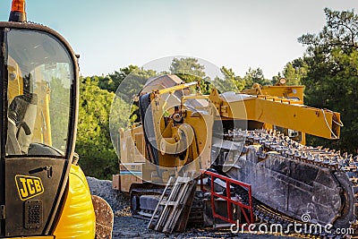 Roadside Machinery JCB and a tarmac grinder/remover Editorial Stock Photo