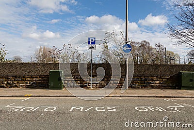Roadside parking for solo motorbikes St Helens Merseyside March 2019 Stock Photo