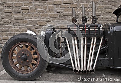 Roadster with unmuffled exhaust pipes Stock Photo