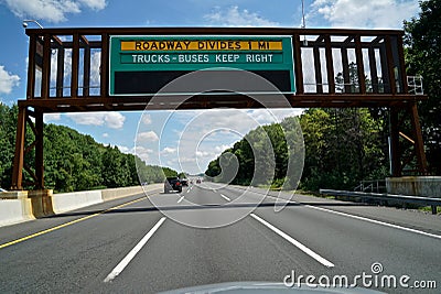 Roadway Divides 1 Mile Sign Stock Photo