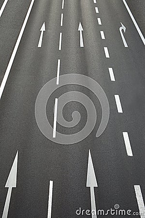 Roadway with road surface marking and arrows pointing straight Stock Photo