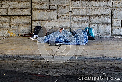 Homeless Couple Sleeping Editorial Stock Photo