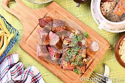 Roast beef wuth spices and magret de canard Stock Photo