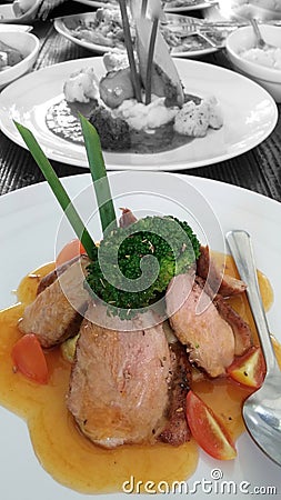 Roast duck with orange sauce Stock Photo