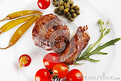 Roast meat medallion with cherry Stock Photo
