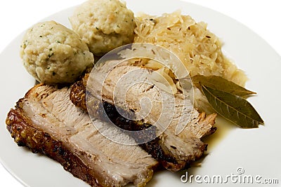 Roast port with pickled cabbage and dumpling Stock Photo