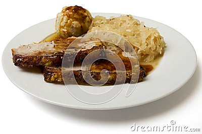 Roast port with pickled cabbage and dumpling Stock Photo