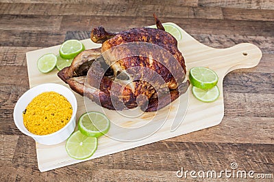 Roaste chicken with farofa and lemon Stock Photo