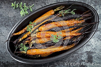 Roasted Baby Carrots Horizontal Overhead View Stock Photo