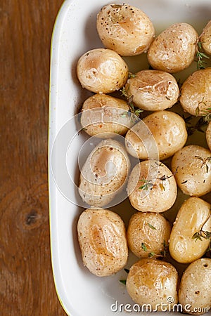 Roasted baby potatoes with thyme Stock Photo