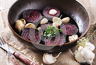 Roasted beetroot over rustic wooden background Stock Photo