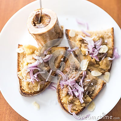 Roasted bone marrow on bread Stock Photo