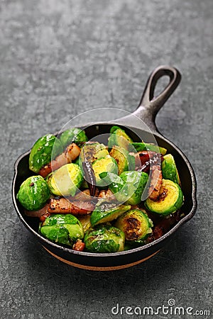 Roasted brussels sprouts with bacon Stock Photo