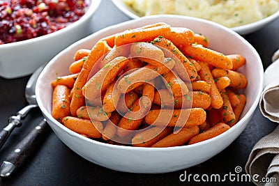 Roasted carrots with fresh herbs Stock Photo