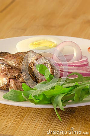 Roasted chicken liver with vegetables Stock Photo