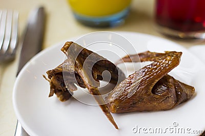 Roasted pigeon wings Stock Photo