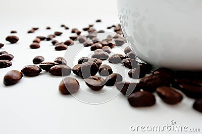 Roasted coffee bean spread on white back ground. Stock Photo