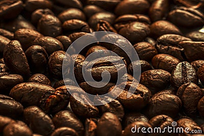 Roasted coffee beans background. international day of coffee. Close up. Selective focus Stock Photo