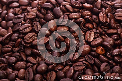 Roasted coffee beans - the beautiful food background Stock Photo