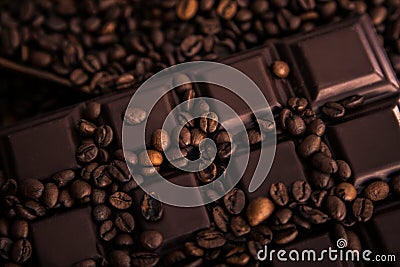 Roasted coffee beans and chocolate bar close-up Stock Photo