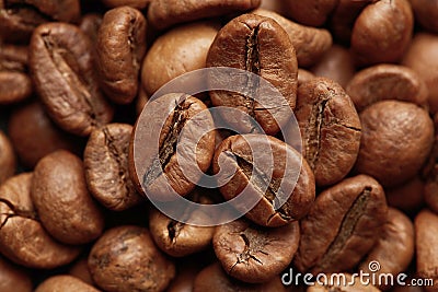 Roasted coffee beans close up. Espresso dark, aroma, black caffeine drink. Stock Photo