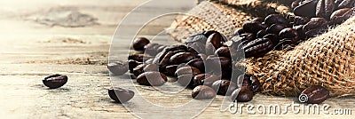 Roasted coffee beans on old wood background Stock Photo