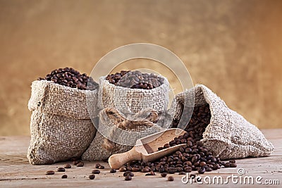 Roasted coffee in burlap bags Stock Photo