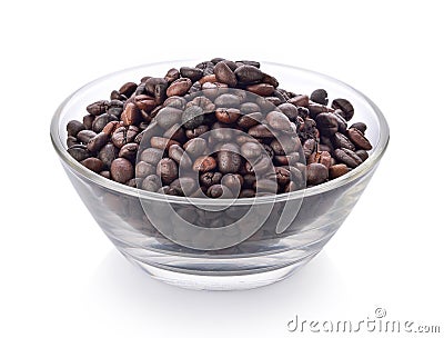 Roasted coffee seeds in a bowl on white background Stock Photo