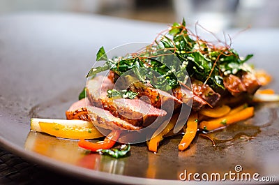 Roasted duck with pak choy Stock Photo