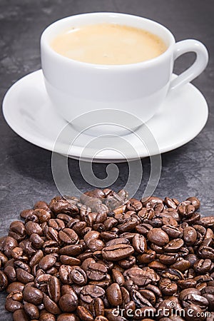 Roasted fragrant coffee beans and coffee with milk Stock Photo