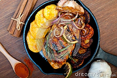 Roasted grilled BBQ chicken breast with herbs and spices Stock Photo