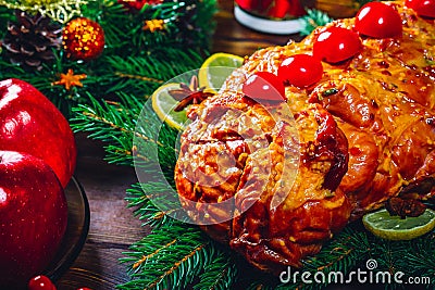 Roasted meats. Thanksgiving table served with turkey, decorated with bright Christmas decor and candles. Christmas dinner Stock Photo