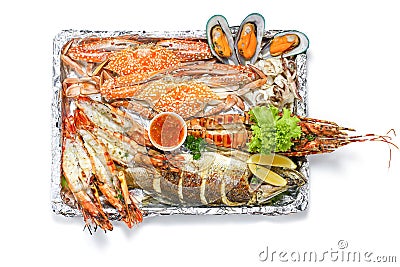 Roasted Mixed Seafood Platter Set contain Lobster, Fish, Blue Clab, Big Prawns, Mussels Clams and Calamari Squids with pieces of Stock Photo