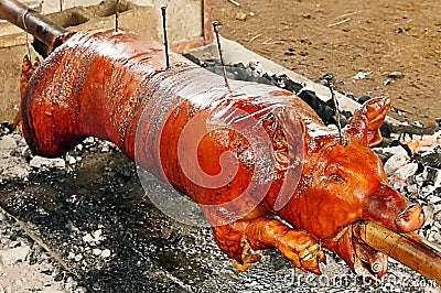 Yo Ron.... Roasted-pig-picture-being-very-hot-charcoal-40277808