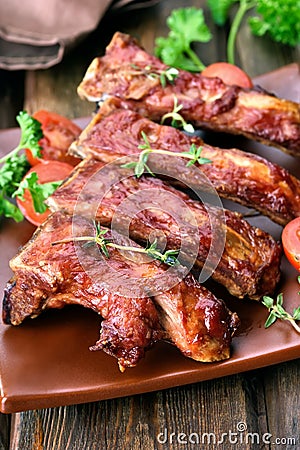 Roasted pork ribs on plate Stock Photo