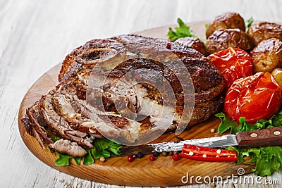 Roasted pork shoulder on the bone Stock Photo