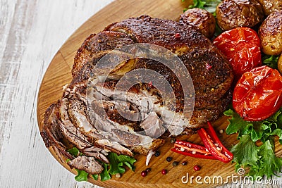 Roasted pork shoulder on the bone Stock Photo