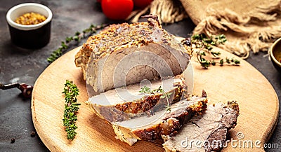 Roasted Pork shoulder cut, Roasted Christmas ham of turkey. large piece of baked pork with mustard Stock Photo