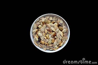 Roasted pumpkin seeds with herbs Stock Photo