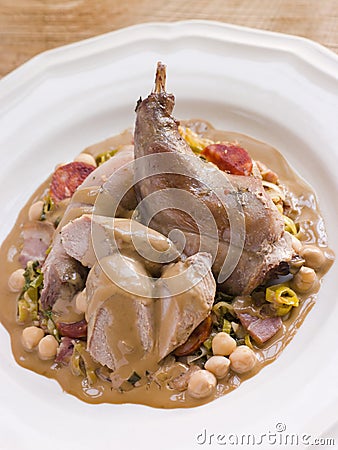Roasted Rabbit with Chickpeas and Cabrales Sauce Stock Photo