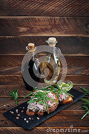 Roasted sandwiches with caramelized onion mixed with cream cheese and herbs. Grilled sandwich Stock Photo