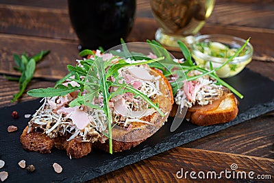 Roasted sandwiches with caramelized onion mixed with cream cheese and herbs. Grilled sandwich Stock Photo