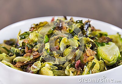 Roasted shaved brussels sprouts with crumbled bacon Stock Photo