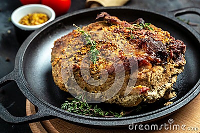 Roasted sliced Christmas ham of turkey. large piece of baked pork with mustard. banner, menu recipe, top view Stock Photo