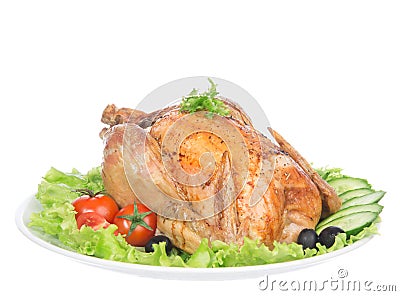 Roasted thanksgiving chicken on a plate decorated with salad Stock Photo