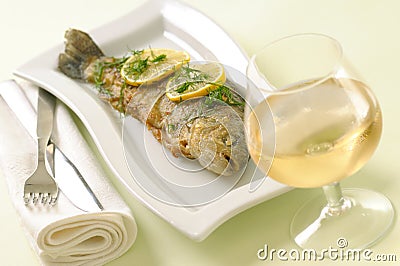 Roasted trout with lemon and dill Stock Photo