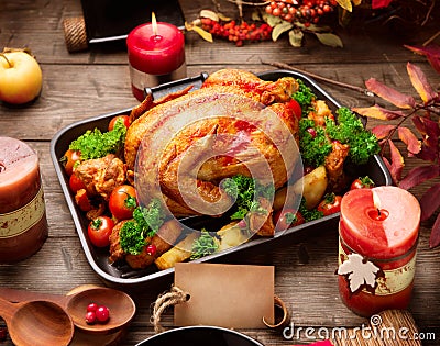 Roasted turkey garnished with potato. Thanksgiving or Christmas dinner Stock Photo