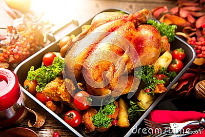 Roasted turkey garnished with potato. Thanksgiving or Christmas dinner Stock Photo