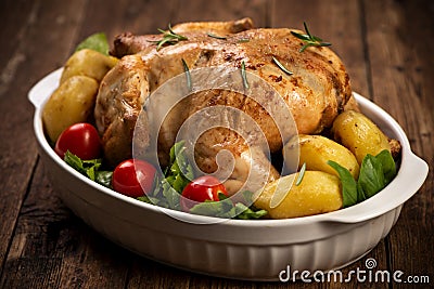 Roasted turkey garnished with potato and veg. Thanksgiving Christmas dinner. Chicken, roasted Stock Photo