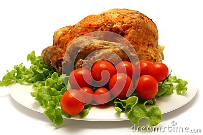 Roasted whole chicken with cherry tomato Stock Photo